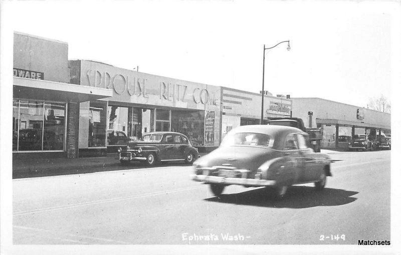 1950s EPHRATA WASHINGTON Sprouse Reitz Automobiles RPPC postcard 10946