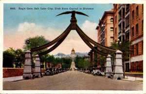 Utah Salt Lake City Eagle Gate With State Capitol In Distance