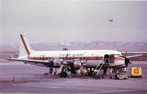 Transair Sweden Douglas DC-7 Airplane Shell Oil Truck in Front