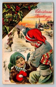 Antique Christmas Postcard Children Snowball Fight Winter Scene Holly Berries