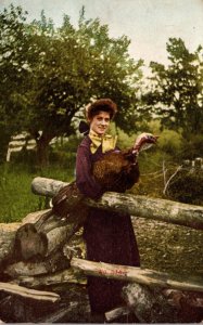 Beautiful Lady Holding Turkey 1909