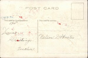 Christmas - Cherub Ringing Gold Bell c1910 Postcard - Embossed