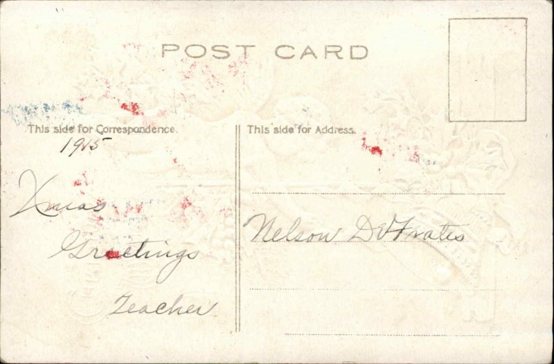 Christmas - Cherub Ringing Gold Bell c1910 Postcard - Embossed