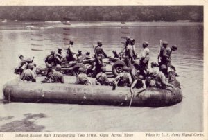 1944 INFLATED RUBBER RAFT TRANSPORTING TWO 37MM. GUNS ACROSS RIVER US Army photo