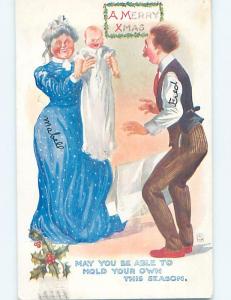 Pre-Linen christmas signed MEN SURPRISED WHEN WOMAN HOLDS UP CRYING BABY HL0185