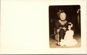 Real Photo Postcard Little Girl with a Large Doll~134634