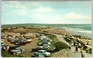 c1960s Dawlish Warren, Devon Postcard The Promenade Parking Lot Ford Anglia Cars