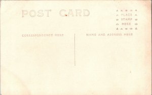 RPPC Children Sitting Around Christmas Tree c1910s Ki10