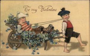 Valentine - Kids Playing Pulling Boy in Wagon w/ Flowers c1910 Postcard