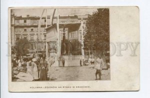 424249 POLAND KRAKOW column of legions in market Vintage postcard