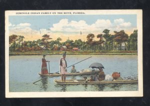 SEMINOLE INDIAN FAMILY ON THE MOVE CANOE BOATS FLORIDA VINTAGE POSTCARD INDIANS