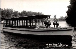 Real Photo Postcard Olson Boat Company in Wisconsin Dells, Wisconsin