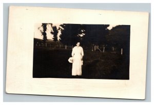 Vintage 1916 RPPC Postcard Woman in White Dress with Bouquet in Field
