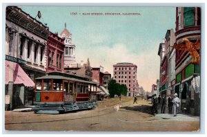 c1950's Main Street Trolley Dirt Road Buildings People View Stockton CA Postcard 
