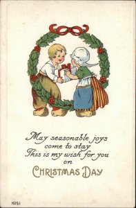 Christmas Dutch Children Wreath Embossed Bergman c1900s-20s Postcard