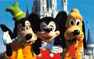 Goofy, Mickey and Pluto great magic kingdom guests Disneyland, CA, USA Disney...