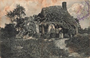 WWI German Soldiers Camouflaged Thatched House RPPC Feldpost Postcard 1915