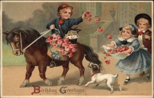 Birthday Boy on Pony Throws Flowers to Little Girl c1910 Vintage Postcard