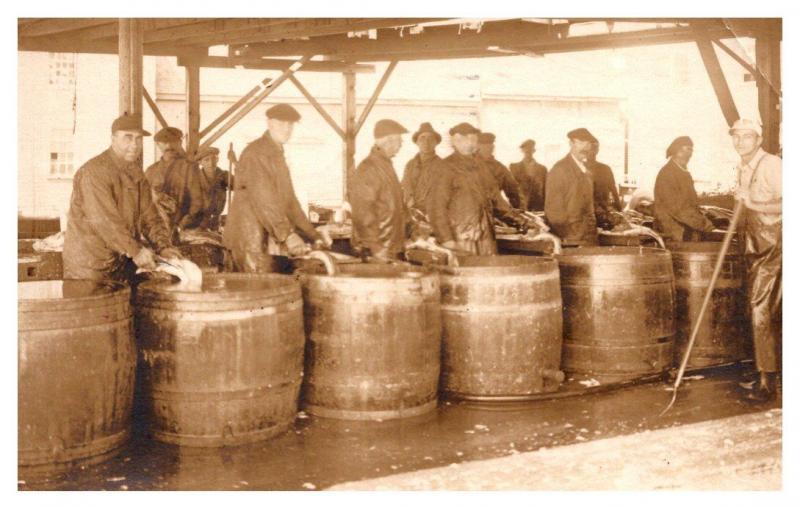    Men Cleaning Fish into Wooden Barrels RPC 