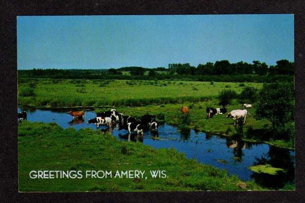 WI Greetings from AMERY WISCONSIN Postcard PC Cows Cattle Carte Postale