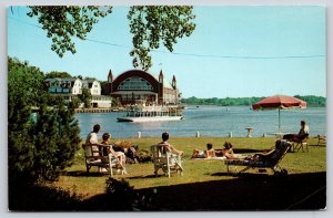 Saugatuck MI~Kalamazoo River~Big Pavilion~Umbrella~Boat Trip~1950s Postcard