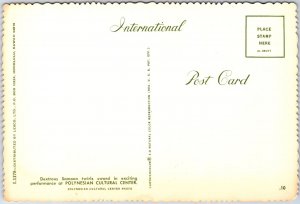 CONTINENTAL SIZE POSTCARD DEXTROUS SAMOAN TWIRLS AT POLYNESIAN CULTURAL CENTRE