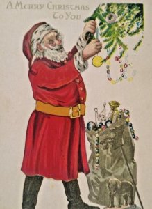 Santa Claus Christmas Postcard Decorating Tree Sack Of Toys Full Figure Embossed