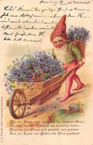 L404 Greetings 1903 Dwarf pushing cart flowers luck vintage postcard