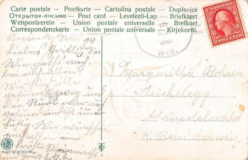 L395 Christmas Greetings 1910 Angel and child embossed postcard