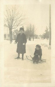 RPPC Postcard Happy Boy With Snowballs & Pouting Kid on Sled, Unknown US