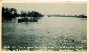 CT - Hartford. March 1936 Great Flood. Shell Oil Tank in River