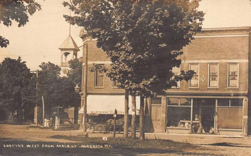 Real Photo Postcard Looking West from Main Street in Machias, New York~116513