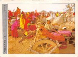 BG21489 pushjar fair  rajasthan people types children cow vache folklore india