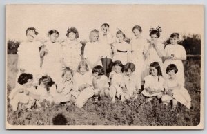 RPPC Young Girls Party Sunday School Hair Bows Braids Field Postcard B30