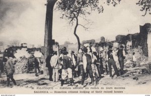 SALONICA, Greece, 1917; Homeless citizens looking at their ruined houses afte...