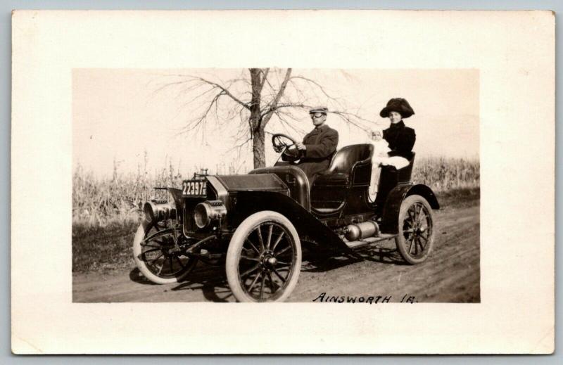 Ainsworth Iowa~Family in Vintage Automobile~Dad in Goggles~LP#22397~c1912 RPPC 