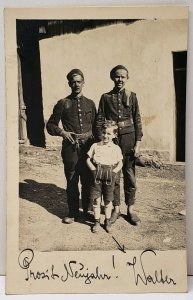 RPPC Austria Soldiers, Guards, Workers Posing with Child Postcard E12