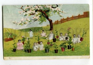 3112098 MULTIPLE BABIES as Flowers in Garden COLLAGE old