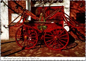 Postcard Hand pumped engine used to fight fire at Capitol in 1851