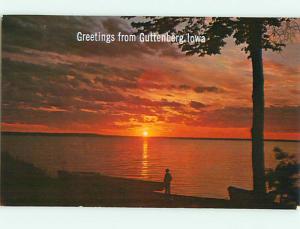 Pre-1980 GREETINGS FROM - SILHOUETTE OF SUNSET AT SHORELINE Guttenberg IA Q3569