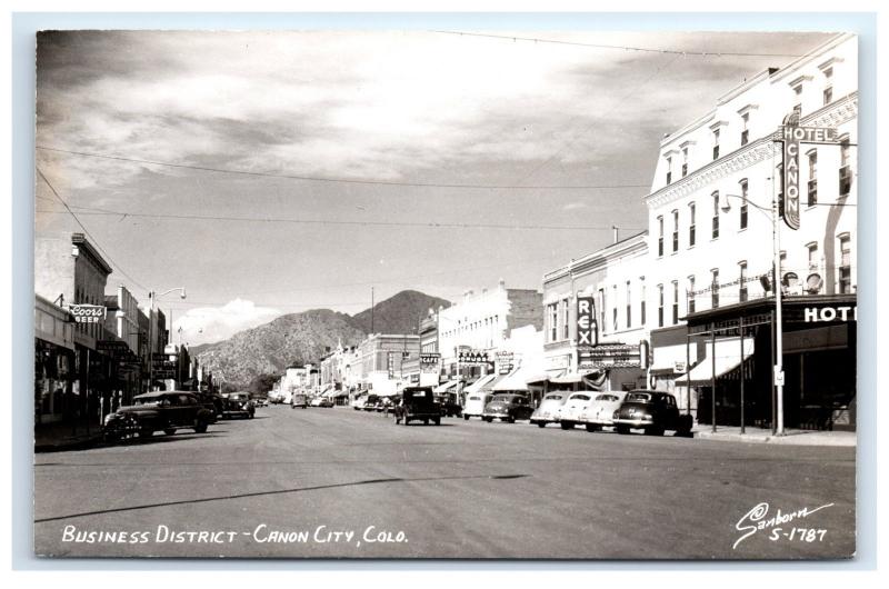 Postcard Business District, Canon City, CO Coors Beer REX Hotel 1950+ RPPC H13