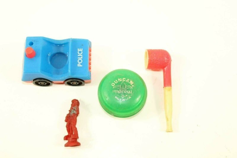 4 Retro Toys Rubber Space Man Fisher Price Police Car Duncan Yo-Yo Pipe