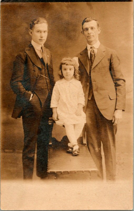 Vtg Early Studio View RPPC Portrait of 2 Dapper Men in Suits w Little Girl UNP