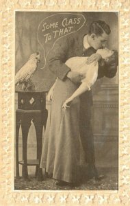 Vintage Postcard 1911 Some Class To That.  Man & Woman in Love & Kissing Parrot