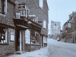 GOUDHURST High Street C. VERRALL Chemist & FRED SOUTHON Store - Old RP Postcard