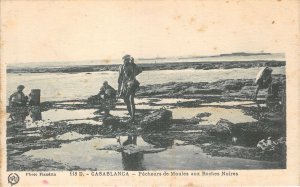 Lot133 casablanca morocco black rock mussel fishermen africa