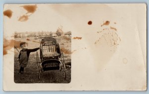 c1910's Little Boy With Stroller  Scene Field RPPC Photo Antique Postcard