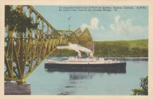 QUEBEC, Canada, 1910-20s; Ocean-liner clearing the Quebec Bridge