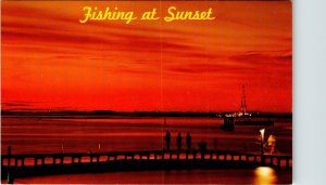 Fishing at Sunset,Shore of Padre Island National Seashore Park,TX