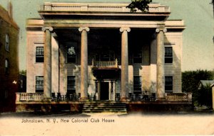 Johnstown, New York - Man on rocking chair at the New Colonial Club House - 1908